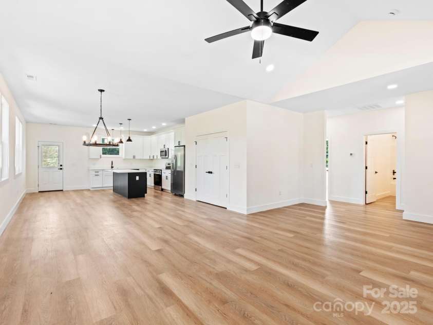 169 Vineyard Village Drive, Old Fort, NC 28762.  MLS# CAR4268925, YatesRealty ID 29376. Large double door pantry conceals storage and saves your counter space. 