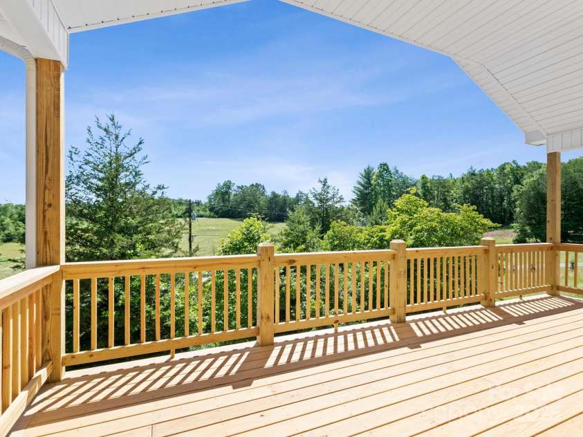 169 Vineyard Village Drive, Old Fort, NC 28762.  MLS# CAR4268925, YatesRealty ID 29376. Pull up a chair and breathe in the fresh mountain air.