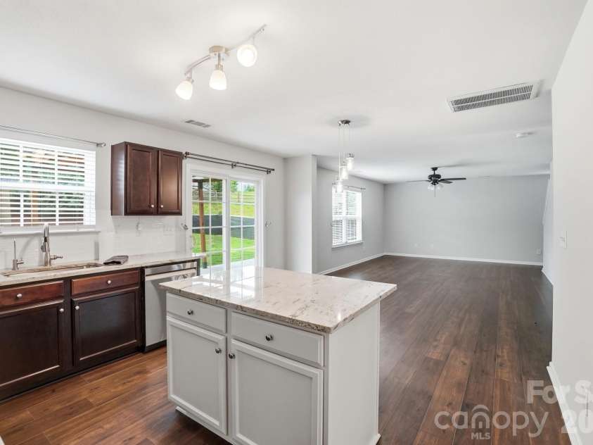 768 Bartram Avenue, Concord, NC 28025.  MLS# CAR4385709, YatesRealty ID 29377. Upgraded granite on countertop surfaces.  Definitely not builder grade!