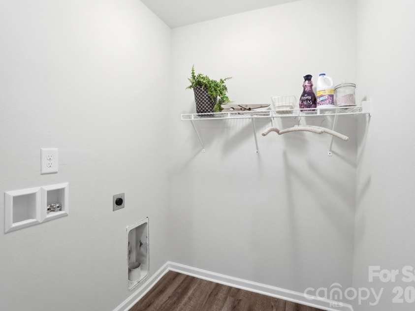 768 Bartram Avenue, Concord, NC 28025.  MLS# CAR4385709, YatesRealty ID 29377. Upper level laundry room with a large closet for storage and linens.