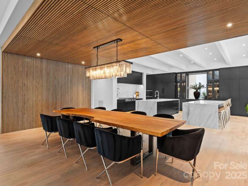 2116 Woodhaven Road, Charlotte, NC 28211.  MLS# CAR4186147, YatesRealty ID 2938. Dining area with maple louvered wall and ceiling panels