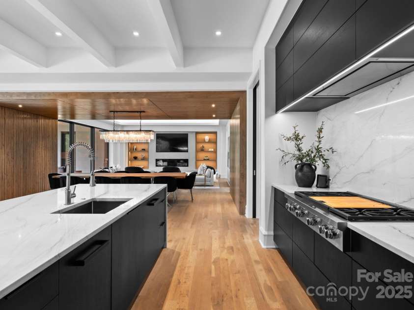 2116 Woodhaven Road, Charlotte, NC 28211.  MLS# CAR4186147, YatesRealty ID 2938. Gourmet kitchen with 48 inch Wolf range with 4 burners and 2 griddle areas