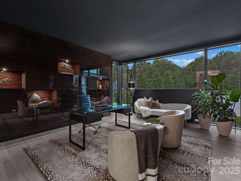 2116 Woodhaven Road, Charlotte, NC 28211.  MLS# CAR4186147, YatesRealty ID 2938. Main level study with floor to ceiling windows, custom wall of cabinetry and niches, and pocket doors