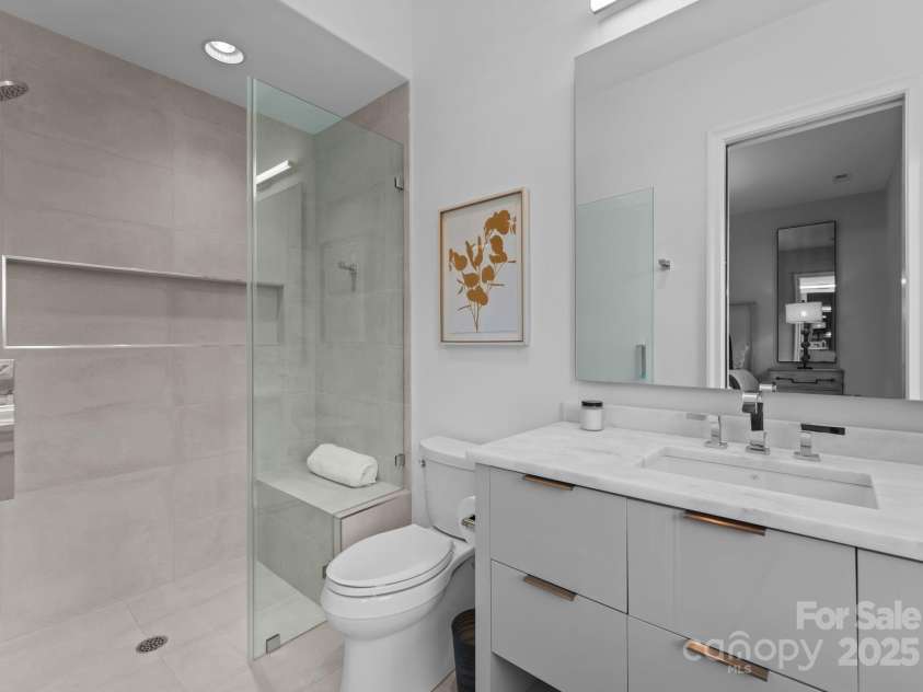 2116 Woodhaven Road, Charlotte, NC 28211.  MLS# CAR4186147, YatesRealty ID 2938. Upper level ensuite guest bathroom