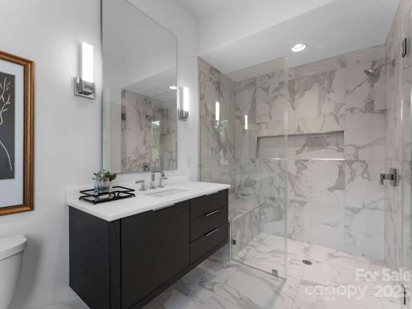 2116 Woodhaven Road, Charlotte, NC 28211.  MLS# CAR4186147, YatesRealty ID 2938. Upper level guest bathroom