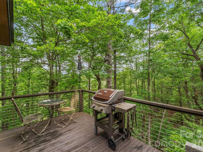 130 Settlement Ridge Drive, Marion, NC 28752.  MLS# CAR4388960, YatesRealty ID 29389. Grill deck