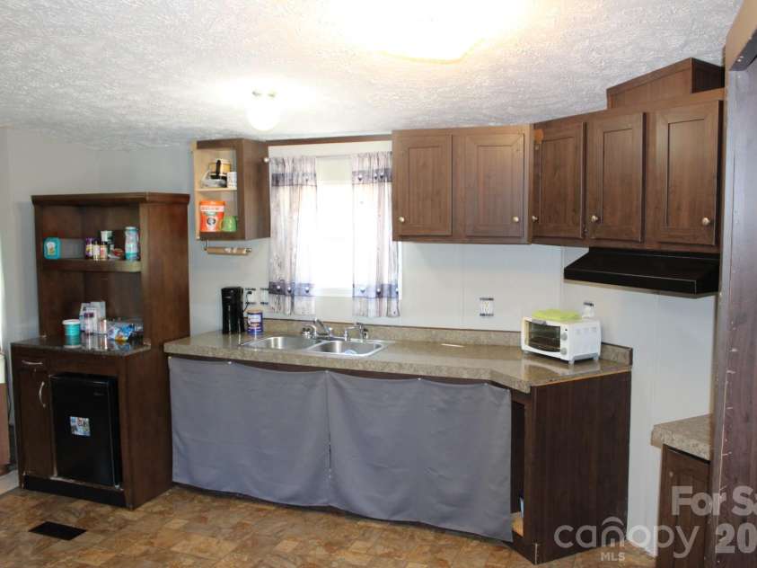 260 Buck Branch Road, Mill Spring, NC 28756.  MLS# CAR4315440, YatesRealty ID 2939. 