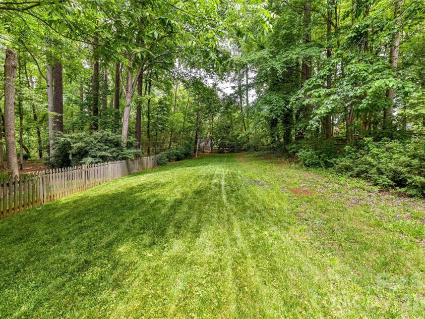 231 Pat Stough Lane, Davidson, NC 28036.  MLS# CAR4381722, YatesRealty ID 29392. Back Side Yard