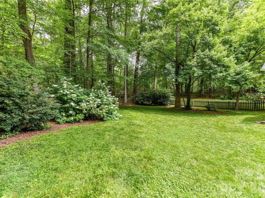 231 Pat Stough Lane, Davidson, NC 28036.  MLS# CAR4381722, YatesRealty ID 29392. Back Yard