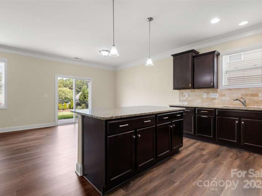 4471 Carrington Drive, Lancaster, SC 29720.  MLS# CAR4279985, YatesRealty ID 29402. Kitchen Island w/ Bar and Breakfast Nook