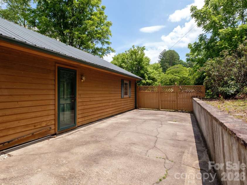 332 Island Cove Road, Penrose, NC 28766.  MLS# CAR4389646, YatesRealty ID 29406. Back patio