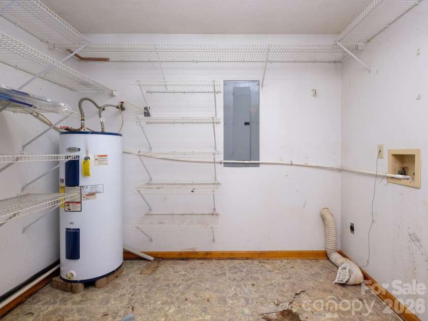 332 Island Cove Road, Penrose, NC 28766.  MLS# CAR4389646, YatesRealty ID 29406. Laundry and storage
