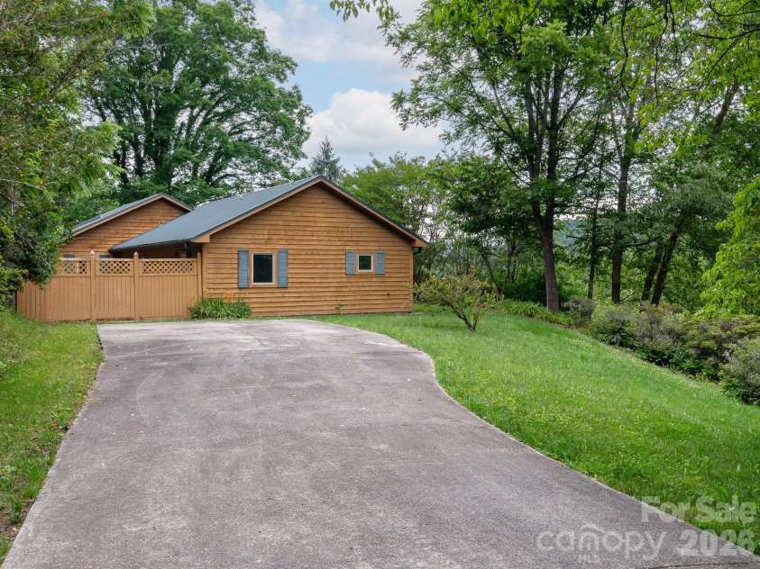 332 Island Cove Road, Penrose, NC 28766.  MLS# CAR4389646, YatesRealty ID 29406. Left side drive way