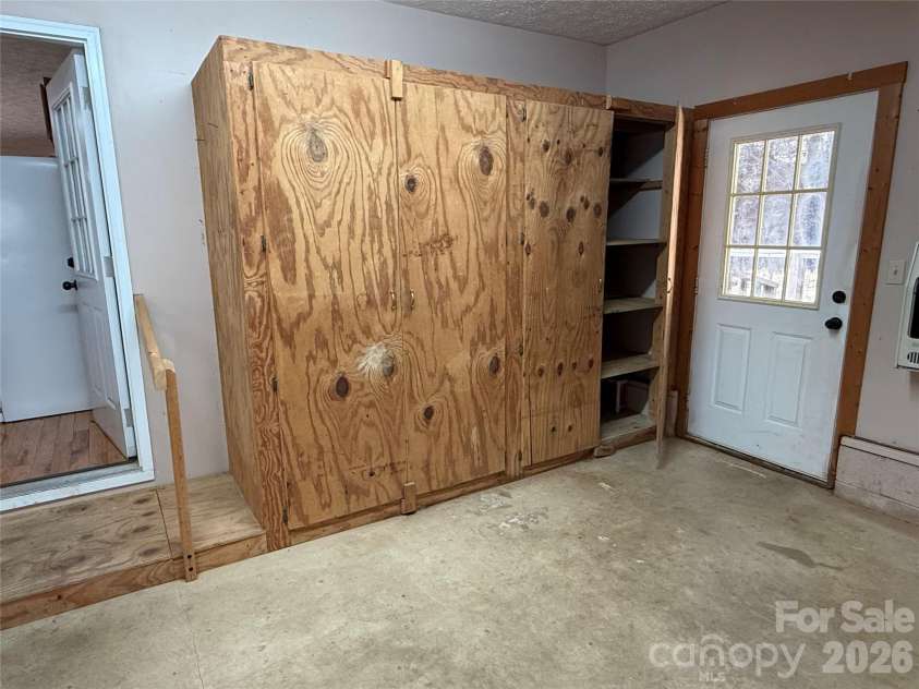 215 Pinellas Lane, Waynesville, NC 28785.  MLS# CAR4351510, YatesRealty ID 2941. Large wall cabinets