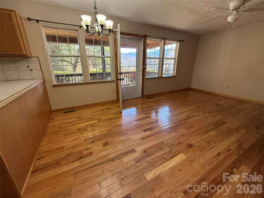 215 Pinellas Lane, Waynesville, NC 28785.  MLS# CAR4351510, YatesRealty ID 2941. Livingroom