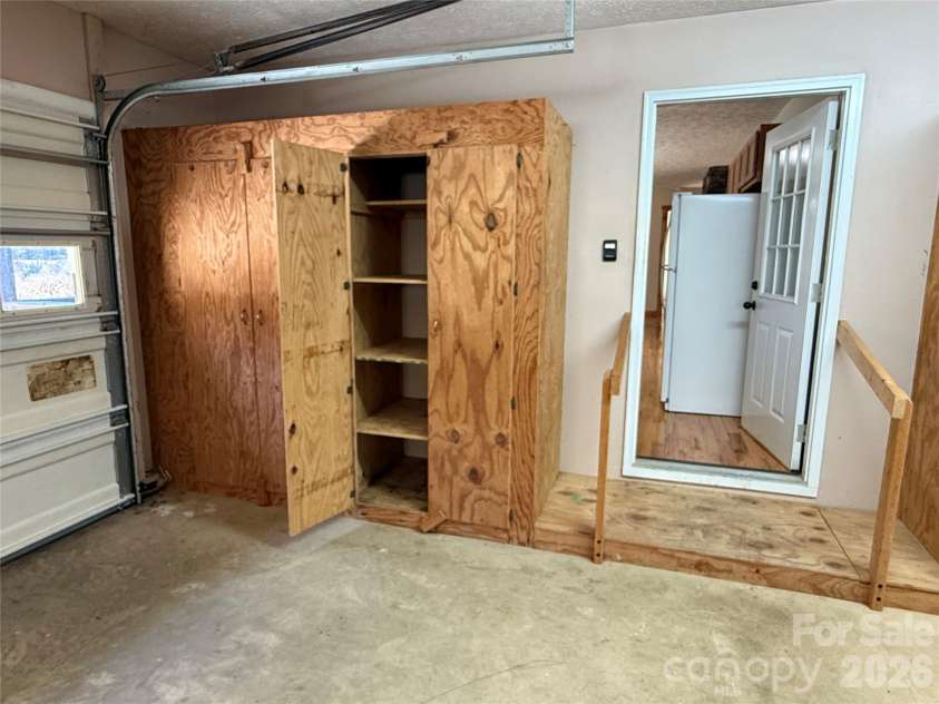 215 Pinellas Lane, Waynesville, NC 28785.  MLS# CAR4351510, YatesRealty ID 2941. Looking into kitchen