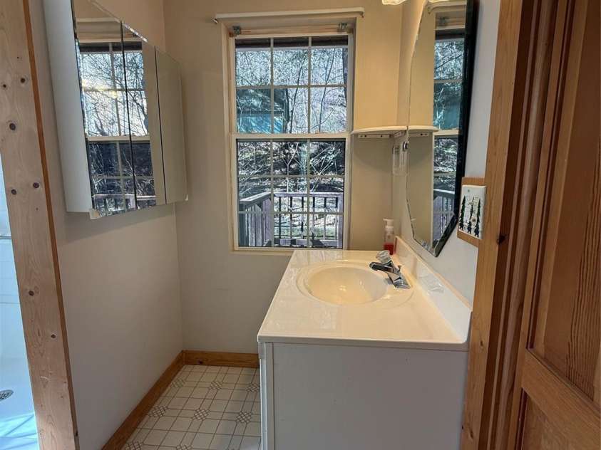 215 Pinellas Lane, Waynesville, NC 28785.  MLS# CAR4351510, YatesRealty ID 2941. Nice bright vanity
