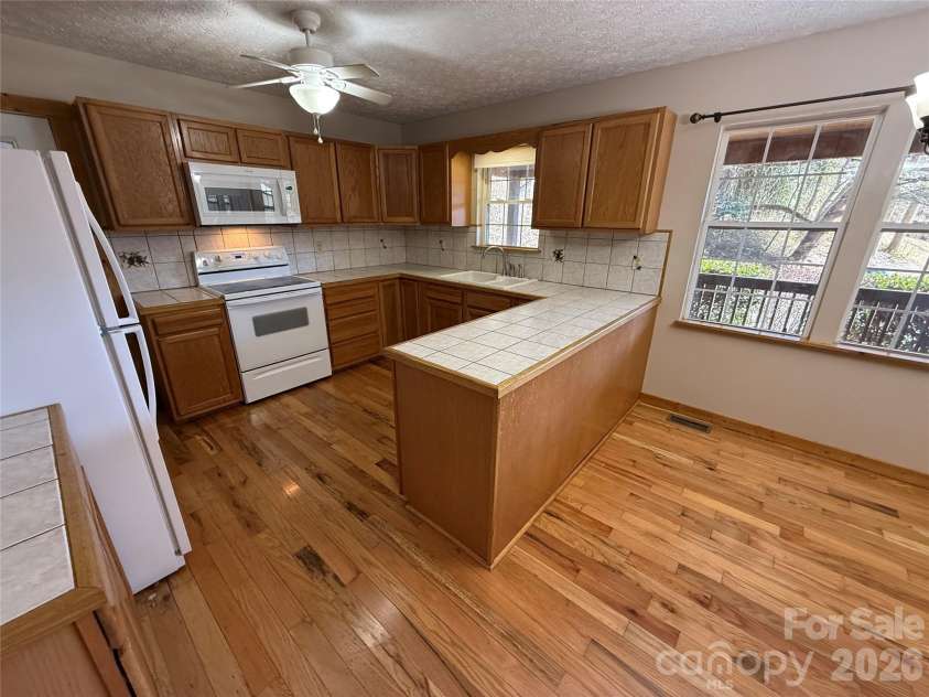 215 Pinellas Lane, Waynesville, NC 28785.  MLS# CAR4351510, YatesRealty ID 2941. Spacious kitchen area