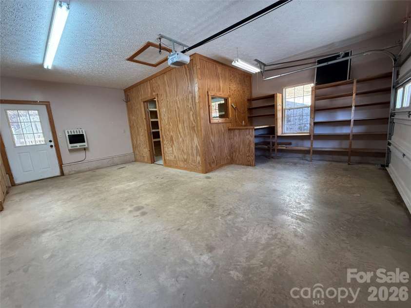 215 Pinellas Lane, Waynesville, NC 28785.  MLS# CAR4351510, YatesRealty ID 2941. 'Storage Room' in garage