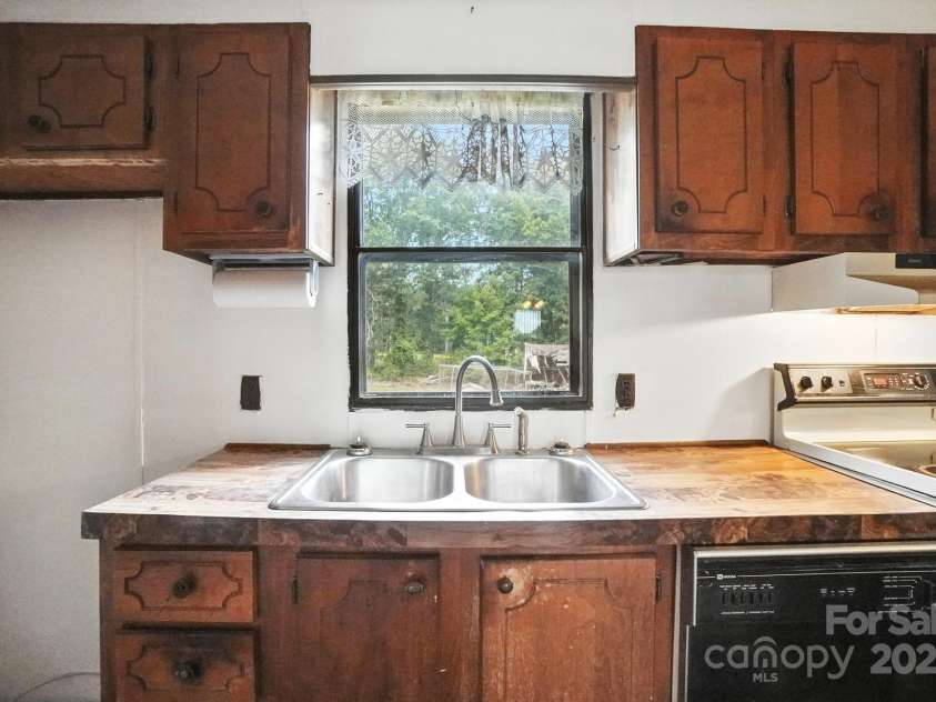 6202 Plyler Mill Road, Monroe, NC 28112.  MLS# CAR4284103, YatesRealty ID 29411. 