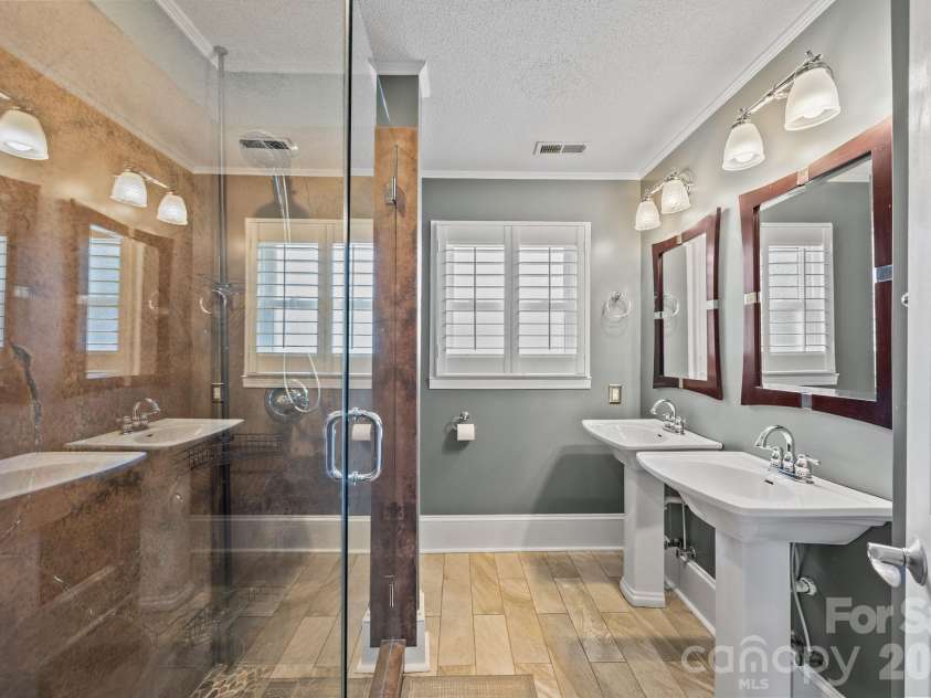 6443 Roanoke Drive, Kannapolis, NC 28081.  MLS# CAR4335703, YatesRealty ID 2942. Hall Bathroom
