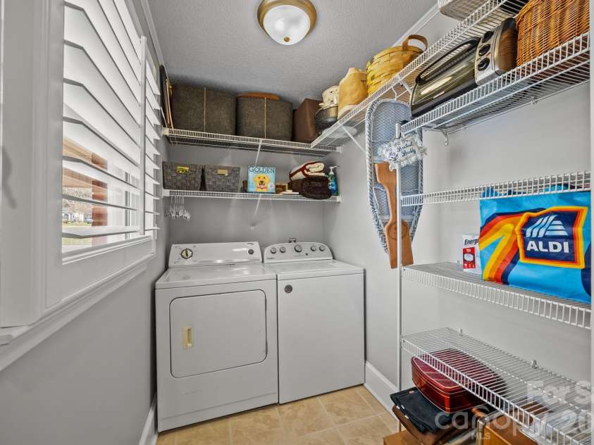 6443 Roanoke Drive, Kannapolis, NC 28081.  MLS# CAR4335703, YatesRealty ID 2942. Laundry and Pantry