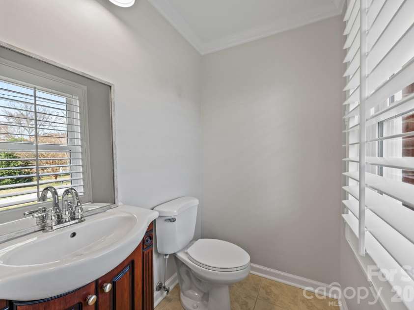 6443 Roanoke Drive, Kannapolis, NC 28081.  MLS# CAR4335703, YatesRealty ID 2942. Primary Half Bath