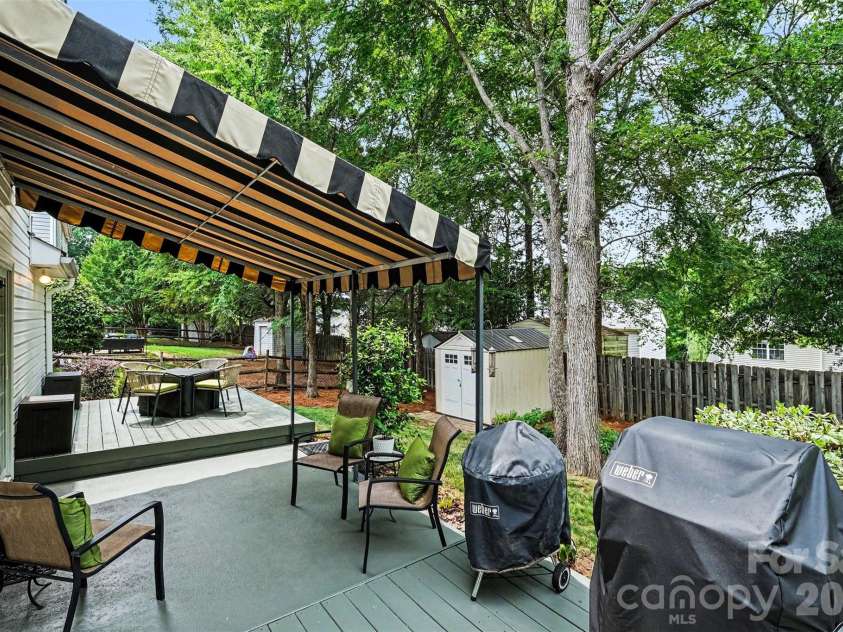 5520 Lemley Road, Concord, NC 28027.  MLS# CAR4388322, YatesRealty ID 29421. Back decks & patio