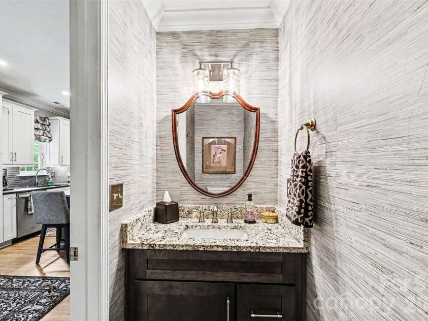 5520 Lemley Road, Concord, NC 28027.  MLS# CAR4388322, YatesRealty ID 29421. First floor powder room