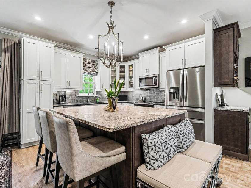 5520 Lemley Road, Concord, NC 28027.  MLS# CAR4388322, YatesRealty ID 29421. Huge kitchen island with counter seating