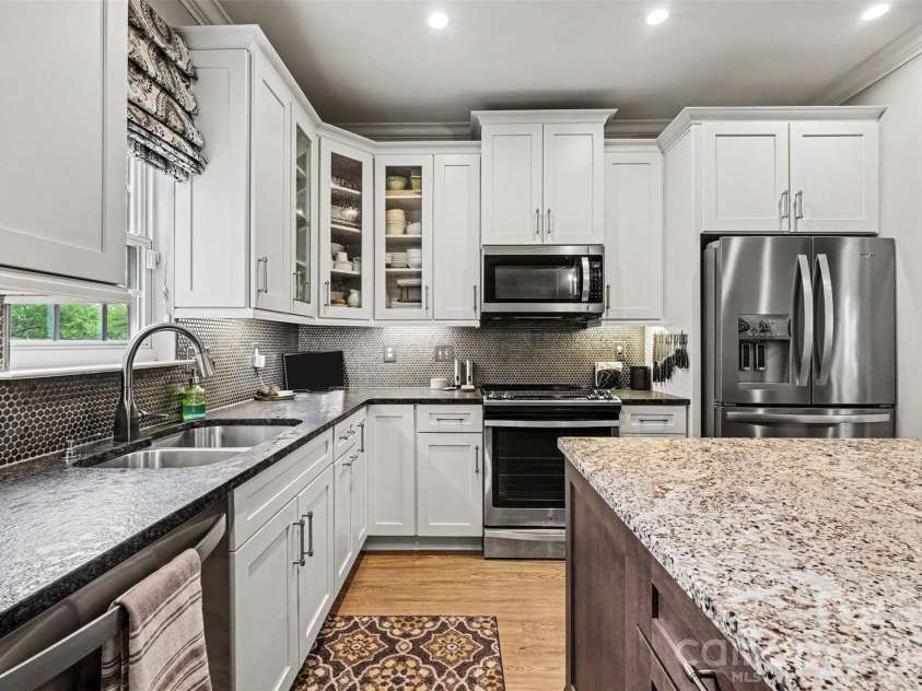 5520 Lemley Road, Concord, NC 28027.  MLS# CAR4388322, YatesRealty ID 29421. Leathered granite countertops