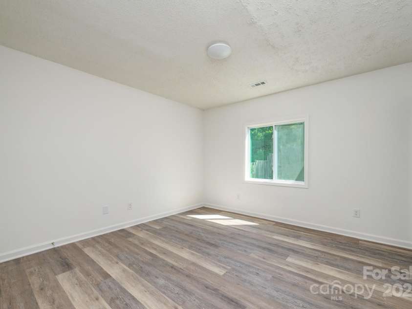 1209 Eagles Landing Drive, Charlotte, NC 28214.  MLS# CAR4282968, YatesRealty ID 29428. Primary bedroom