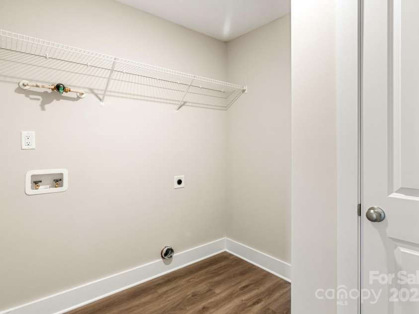 135 Orchard Street, Forest City, NC 28043.  MLS# CAR4199098, YatesRealty ID 29429. Laundry Room
