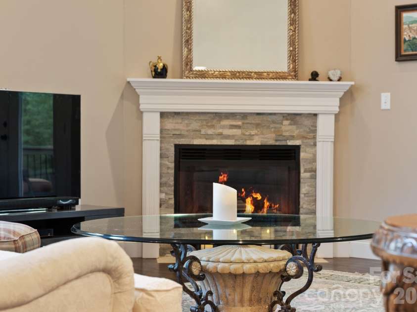 22 Asher Lane, Arden, NC 28704.  MLS# CAR4380408, YatesRealty ID 29433. Gas burning vented fireplace