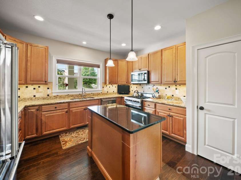 22 Asher Lane, Arden, NC 28704.  MLS# CAR4380408, YatesRealty ID 29433. Kitchen pantry