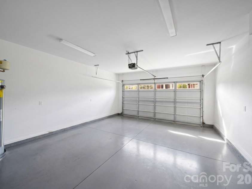 22 Asher Lane, Arden, NC 28704.  MLS# CAR4380408, YatesRealty ID 29433. Two-car garage