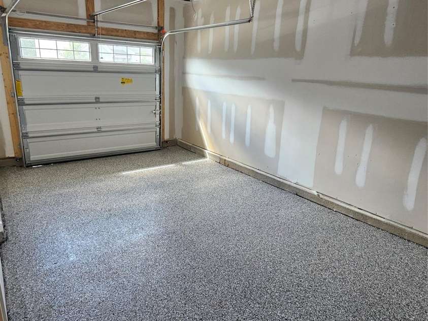 12016 Basking Drive, Charlotte, NC 28214.  MLS# CAR4266827, YatesRealty ID 29436. Garage floor with epoxy coating