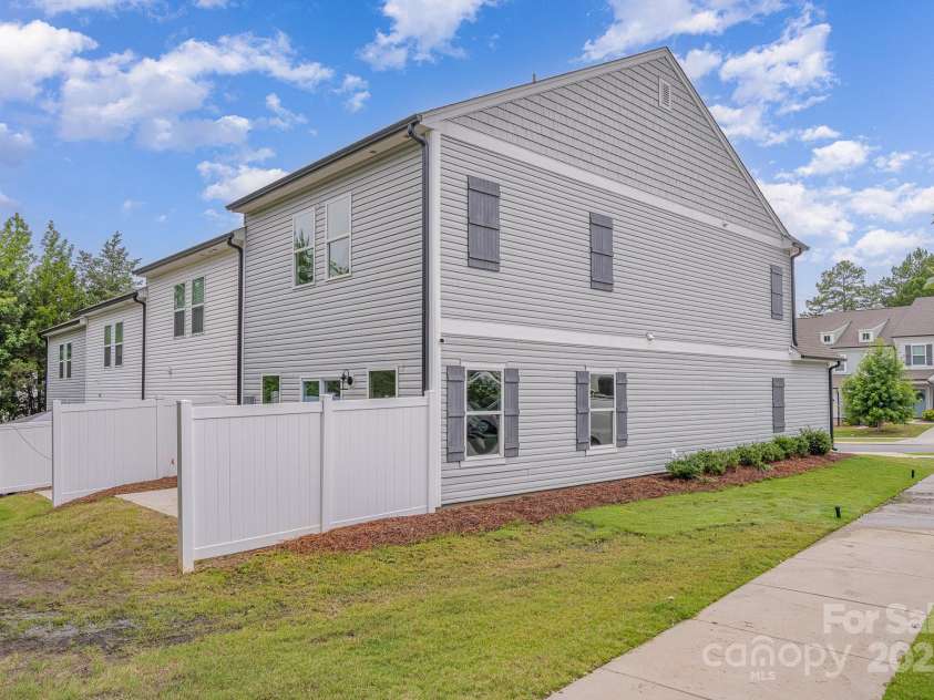 12016 Basking Drive, Charlotte, NC 28214.  MLS# CAR4266827, YatesRealty ID 29436. Side House