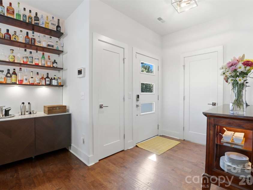 715 28th Street, Charlotte, NC 28205.  MLS# CAR4383784, YatesRealty ID 29441. Entryway with bar