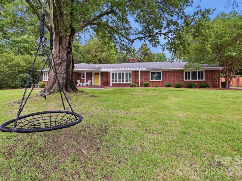 615 Rutledge Avenue, Rock Hill, SC 29732.  MLS# CAR4388294, YatesRealty ID 29444. Large trees are made for swings! Swing does not convey