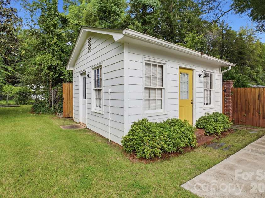 615 Rutledge Avenue, Rock Hill, SC 29732.  MLS# CAR4388294, YatesRealty ID 29444. Shed has a window unit, making it a comfortable hang-out!