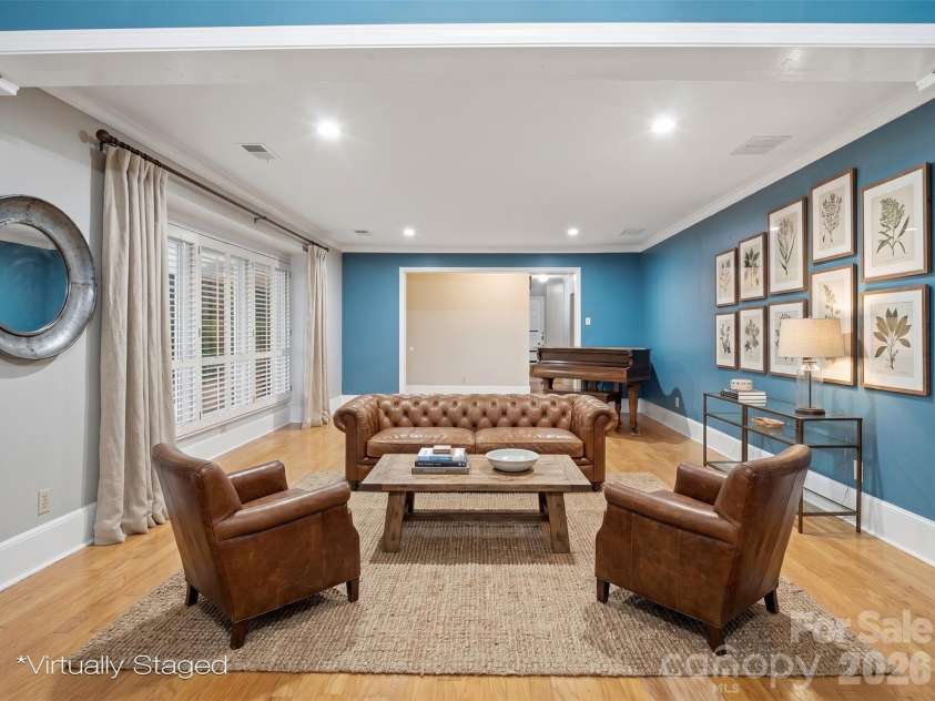615 Rutledge Avenue, Rock Hill, SC 29732.  MLS# CAR4388294, YatesRealty ID 29444. Virtually staged living room off dining room