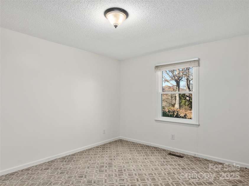 950 Blanton Street, Columbus, NC 28722.  MLS# CAR4210488, YatesRealty ID 29444. Bedroom 2 on main