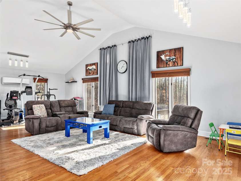 950 Blanton Street, Columbus, NC 28722.  MLS# CAR4210488, YatesRealty ID 29444. Great room/den with exercise area on main