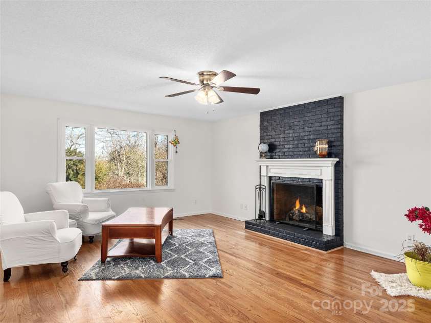 950 Blanton Street, Columbus, NC 28722.  MLS# CAR4210488, YatesRealty ID 29444. Original living room with N/G Fireplace - was used as office