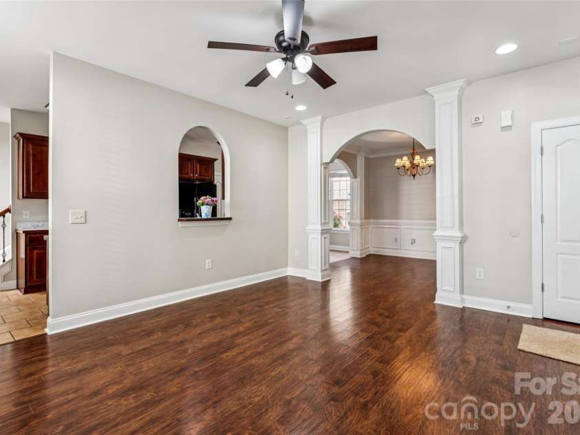 12807 Windy Lea Lane, Huntersville, NC 28078.  MLS# CAR4372915, YatesRealty ID 2945. Livingroom with beautiful floors and gas fireplace
