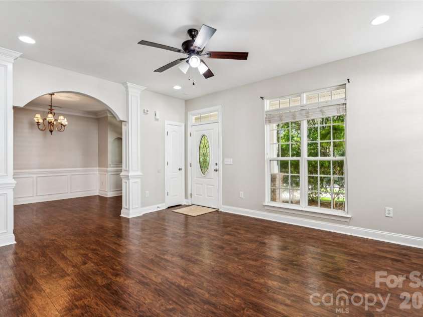12807 Windy Lea Lane, Huntersville, NC 28078.  MLS# CAR4372915, YatesRealty ID 2945. Livingroom with beautiful floors and gas fireplace