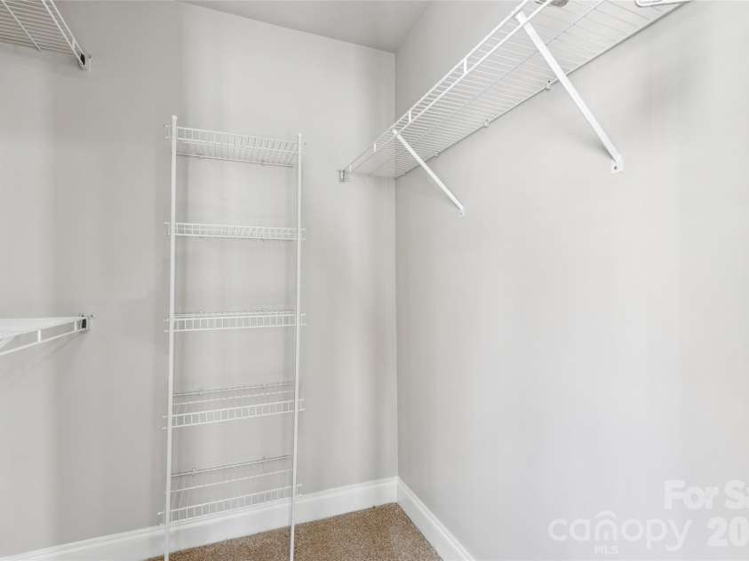 12807 Windy Lea Lane, Huntersville, NC 28078.  MLS# CAR4372915, YatesRealty ID 2945. Walk-in closet on Primary Bedroom on main floor