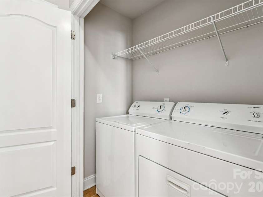 12807 Windy Lea Lane, Huntersville, NC 28078.  MLS# CAR4372915, YatesRealty ID 2945. Washer and dryer on main floor and both convey