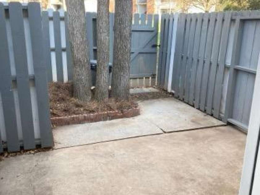 6130 Heathstone Lane, Charlotte, NC 28210.  MLS# CAR4326892, YatesRealty ID 2945. HUGE FENCED PATIO PERFECT FOR PETS AND GRILLING 